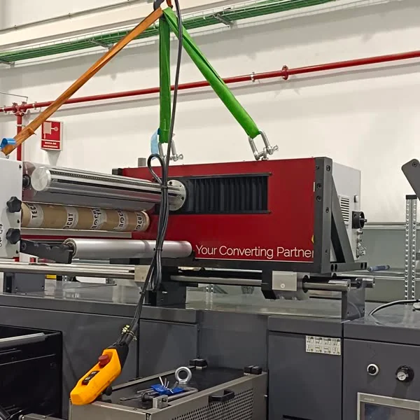Desmasystem being hoisted over the line during installation