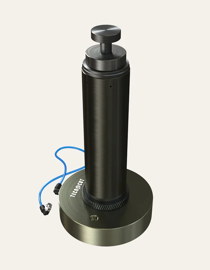 Tecnocut inking cylinder standing on its base, with the compressed air inlet